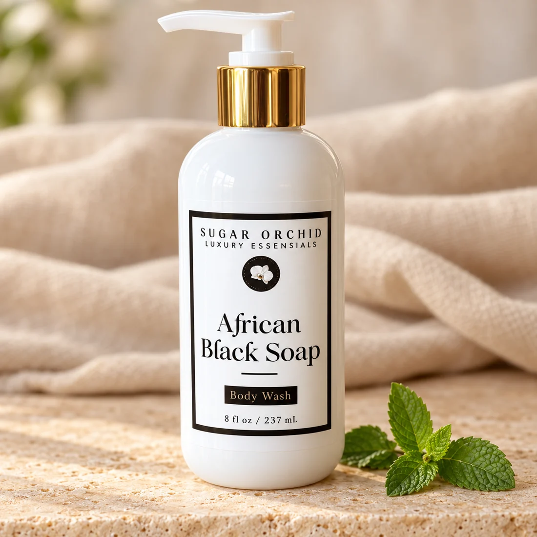 African Black Soap Body Wash white pump bottle with gold collar