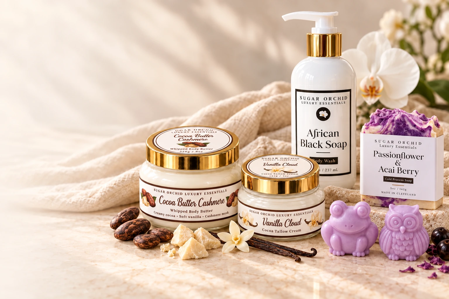 Sugar Orchid closed gold-lid body butter and cocoa tallow cream jars, animal soaps, handmade bar soap and white body-wash bottle